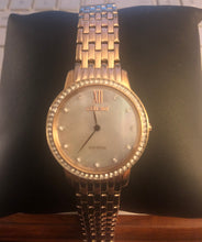 Load image into Gallery viewer, Pre-owned Citizen Eco-Drive Women's EX1483-50D Crystal MOP Dial Rose Gold-Tone 29mm