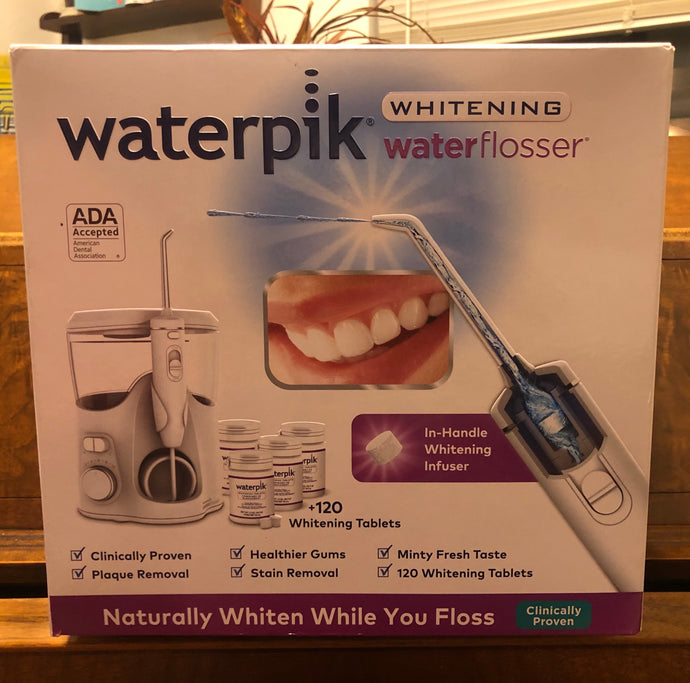 New WaterPik Whitening Water Flosser Set